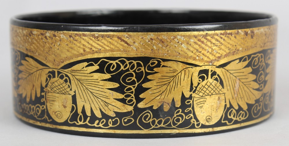 Pair of Regency black and gilt papier-mache coasters View III