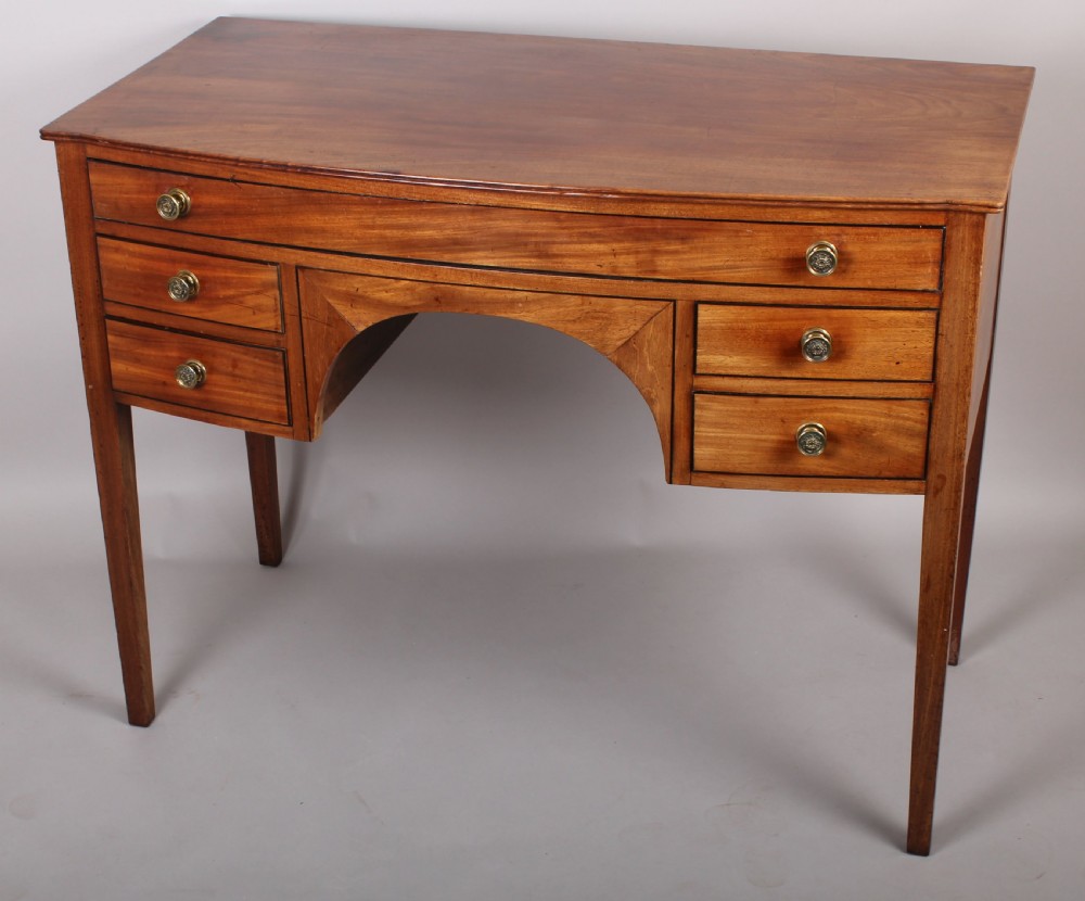 George III period faded mahogany small bow-fronted sideboard