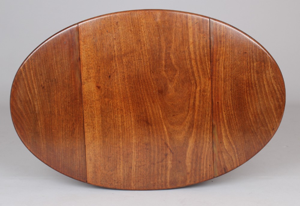 George III period mahogany small oval Pembroke table of simple design  View IV