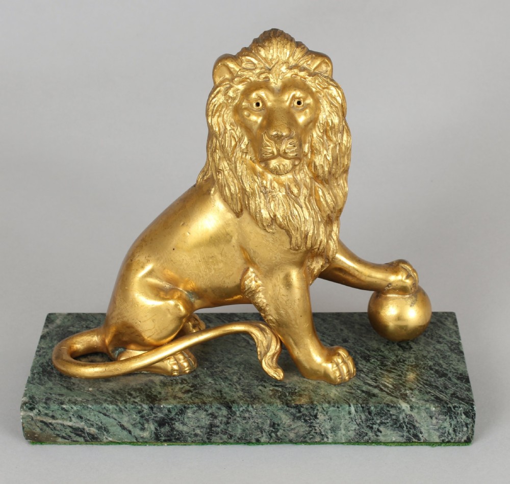 Pair of mid 19th century cast and chased ormolu figures of lions View II
