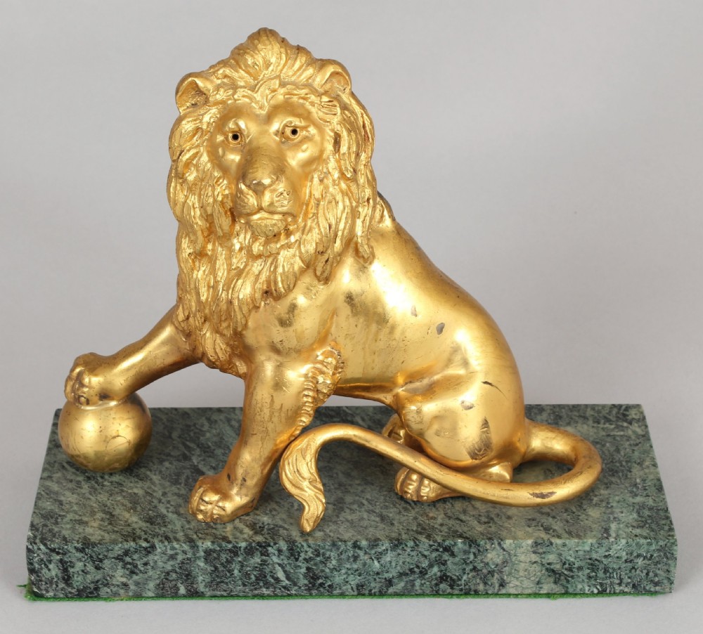 Pair of mid 19th century cast and chased ormolu figures of lions View III