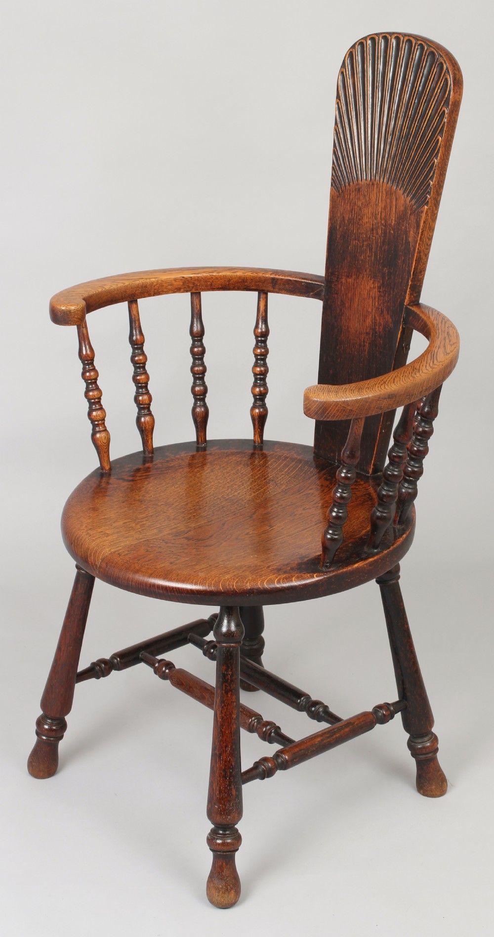 Early 20th century oak arm-chair of unusual form View II