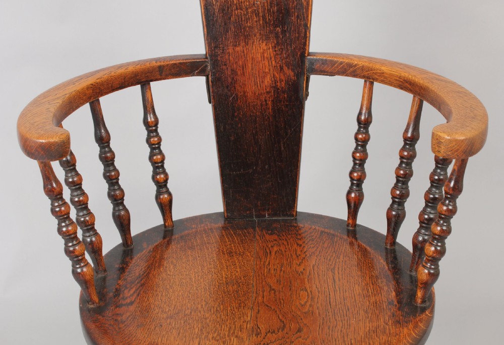 Early 20th century oak arm-chair of unusual form View III