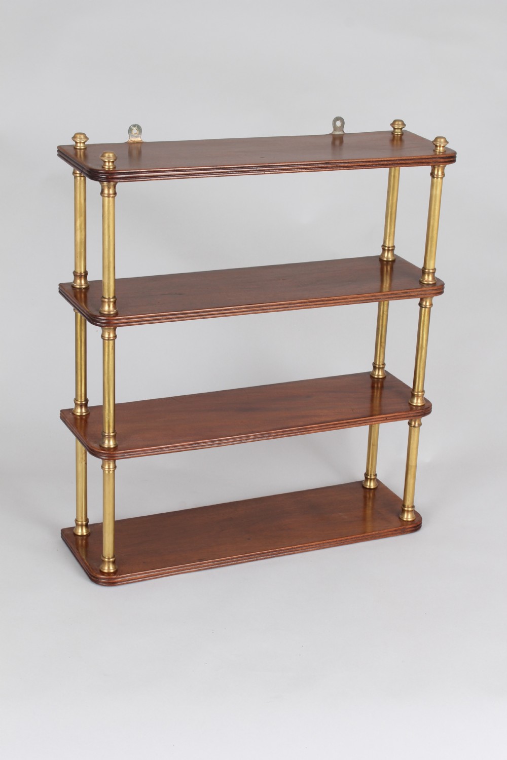 Mahogany and brass wall-shelf of Regency characters View II