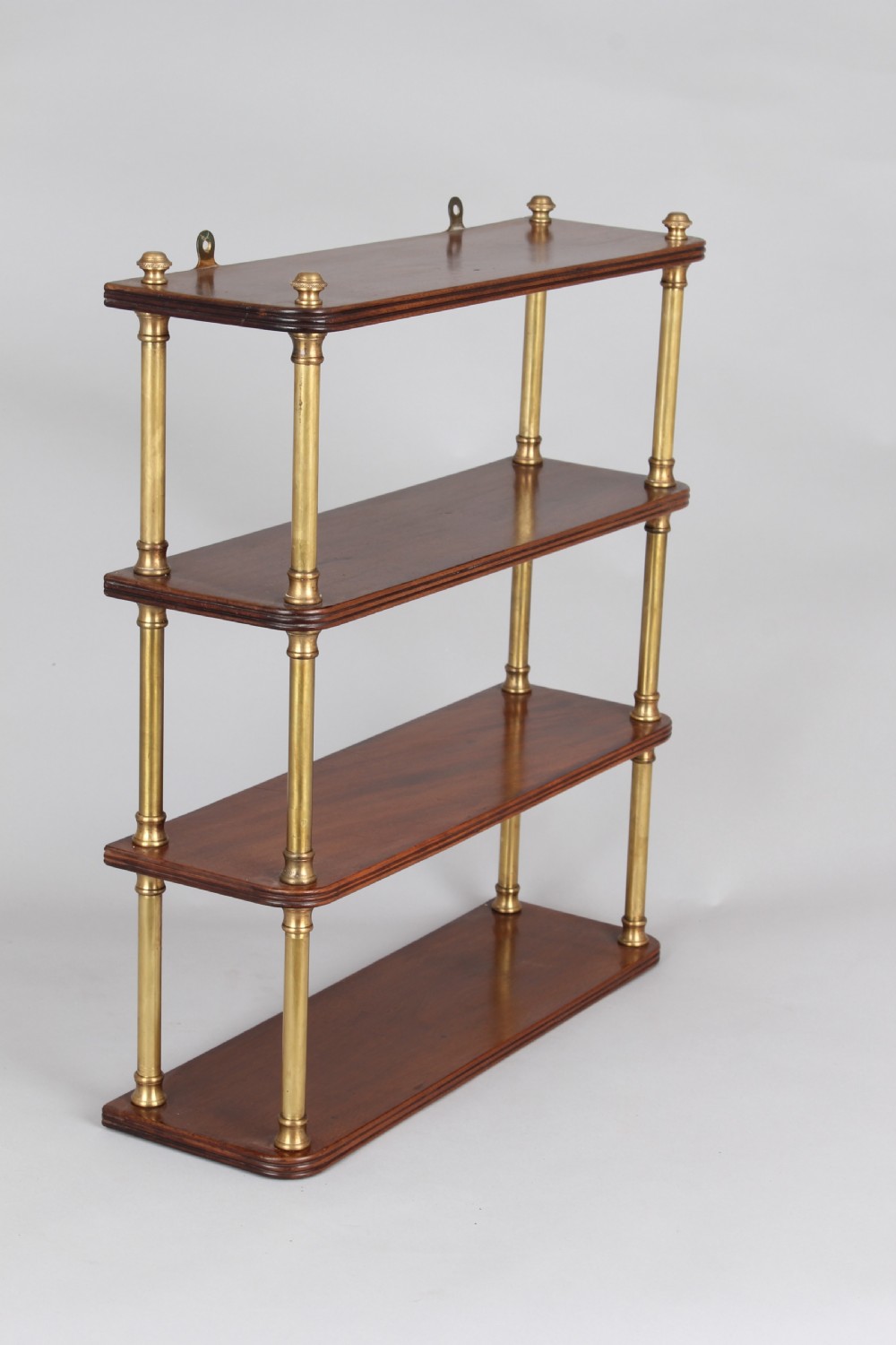 Mahogany and brass wall-shelf of Regency characters View III