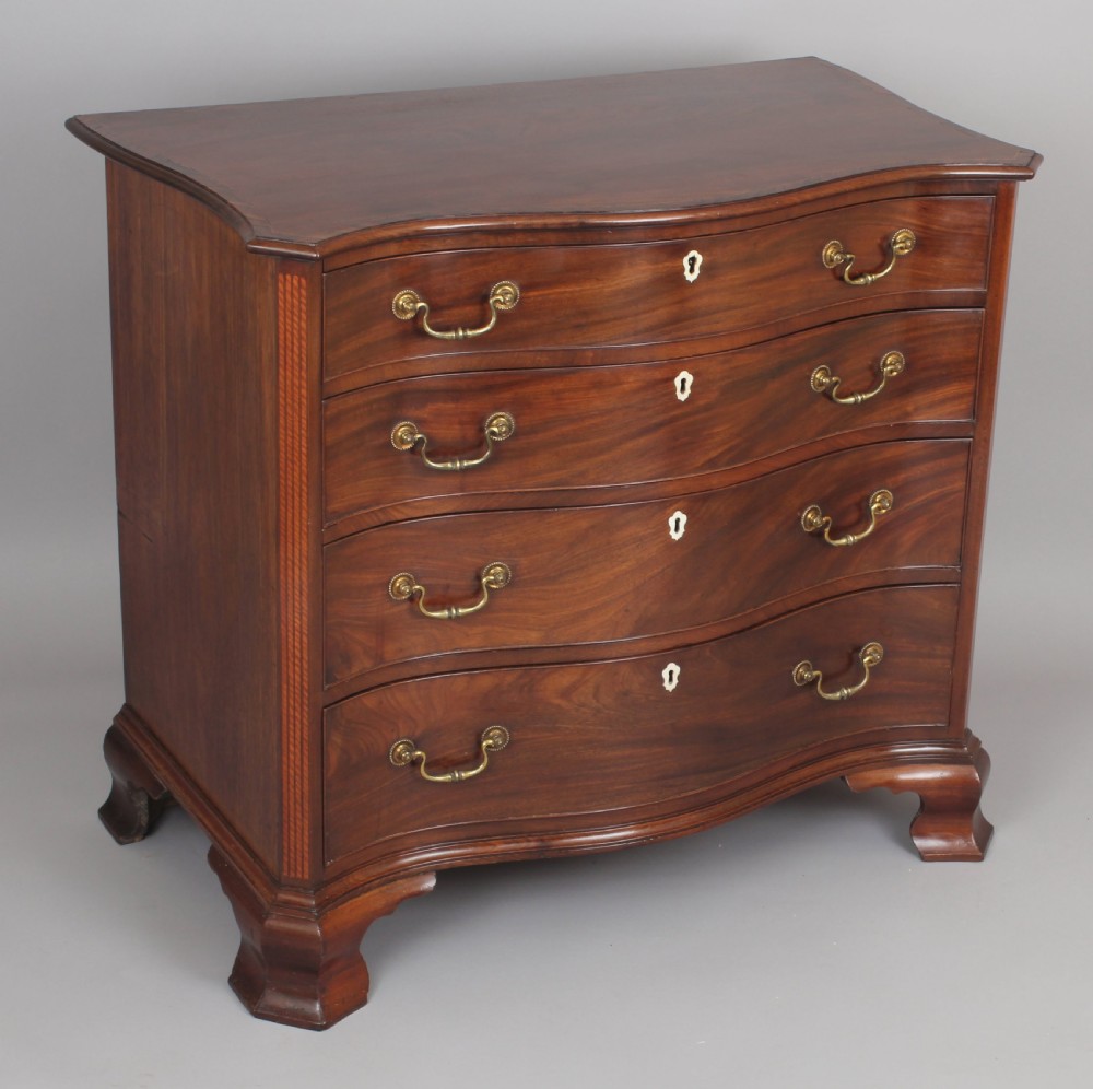 Fine George III period mahogany serpentine dressing-chest of small proportions View V