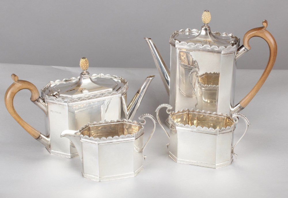 Fine quality George V heavy-gauge silver four-piece tea and coffee service in the late 18th century style