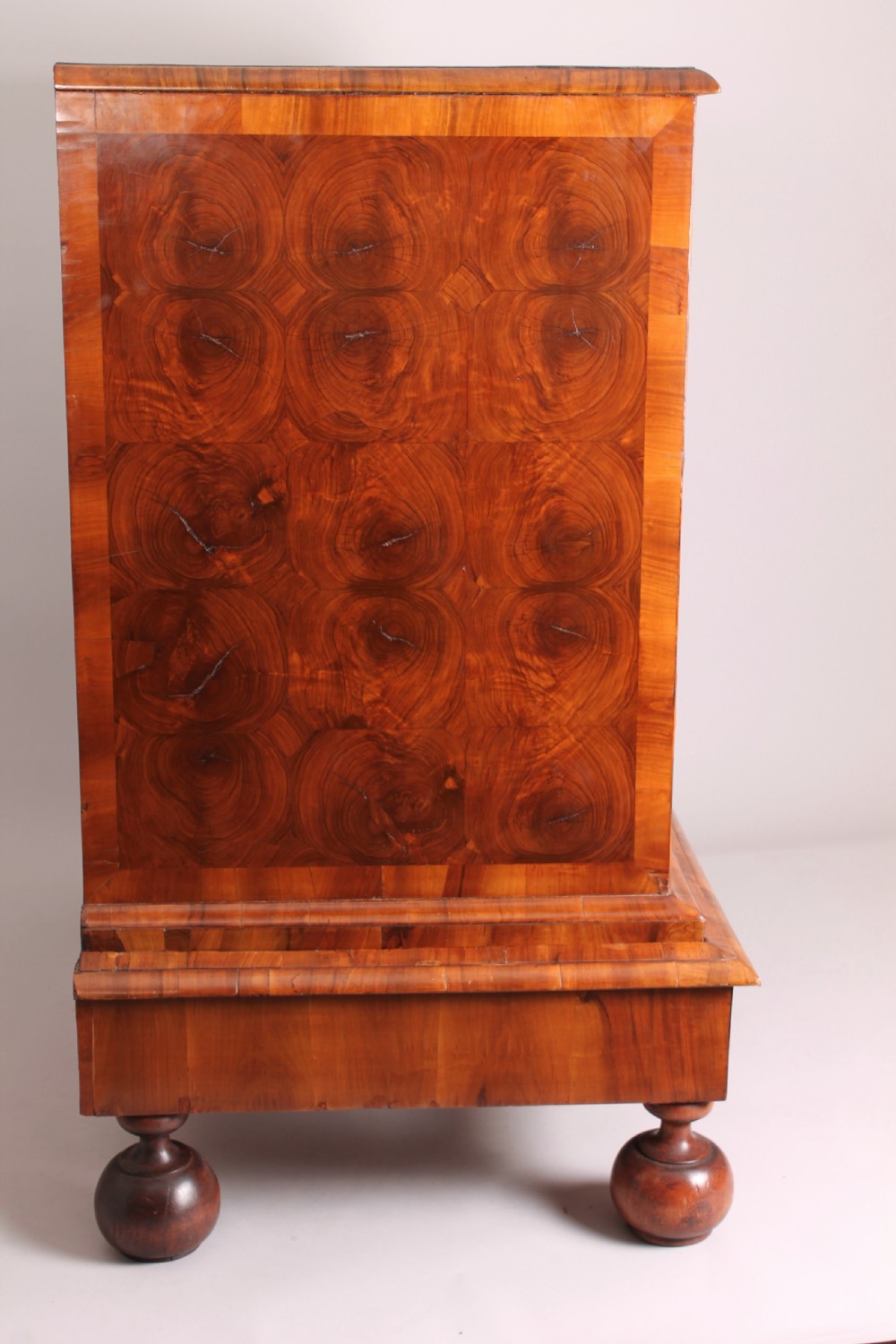 A fine and rare walnut oyster-piece chest-on-stand View III