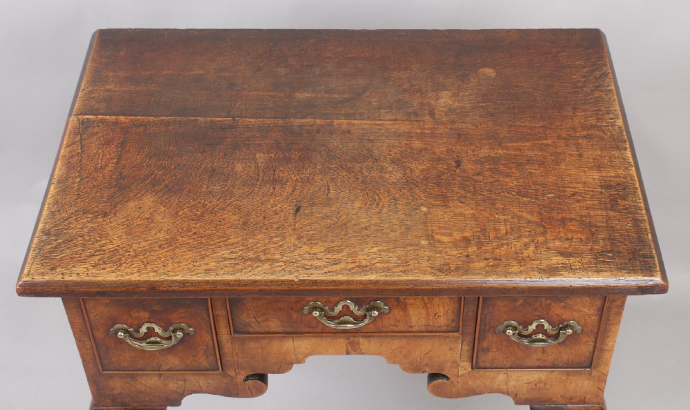 George II period walnut and oak lowboy View III