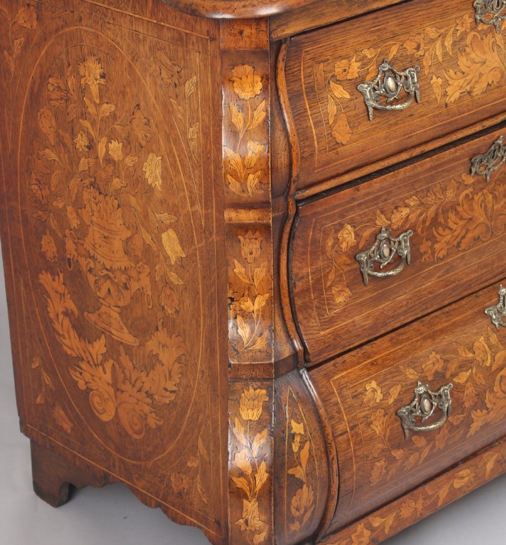 Eighteenth century Dutch walnut and marquetry chest-of-drawers of bold bombe form  View III