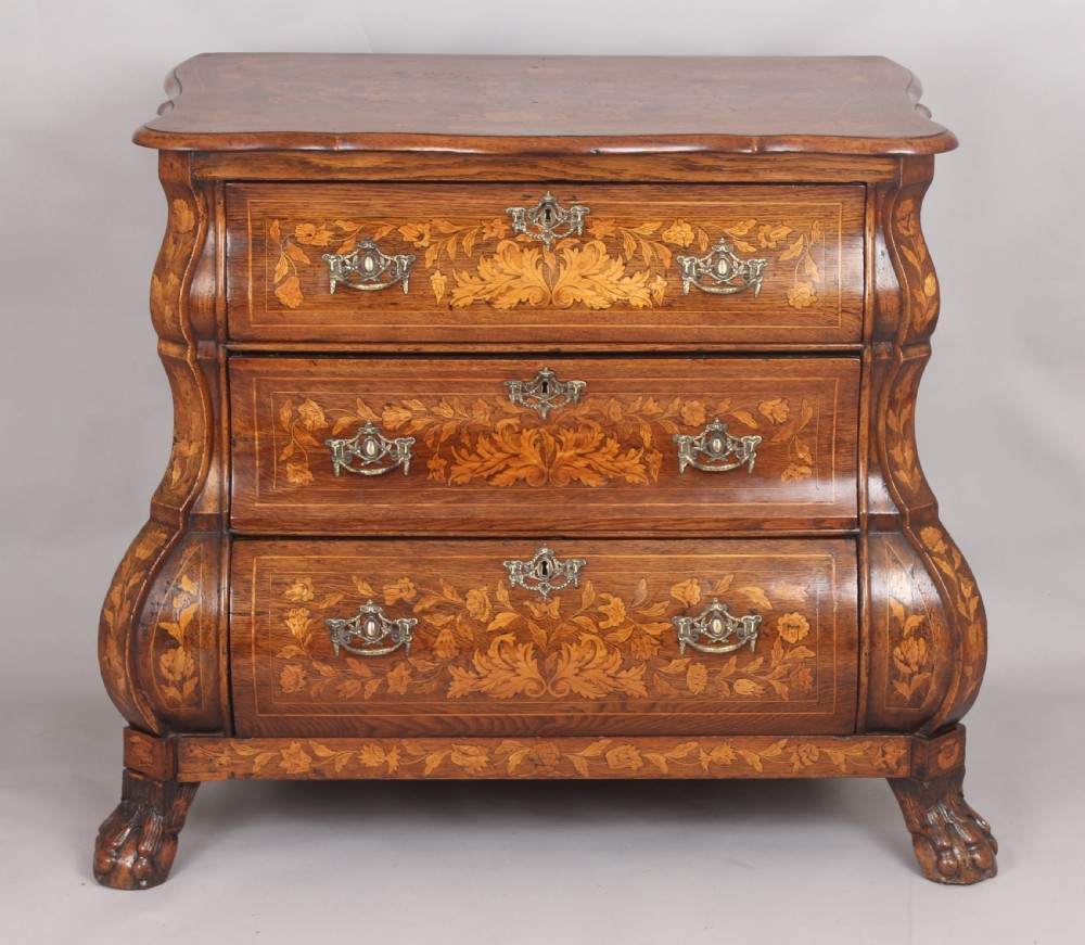 Eighteenth century Dutch walnut and marquetry chest-of-drawers of bold bombe form  View IV