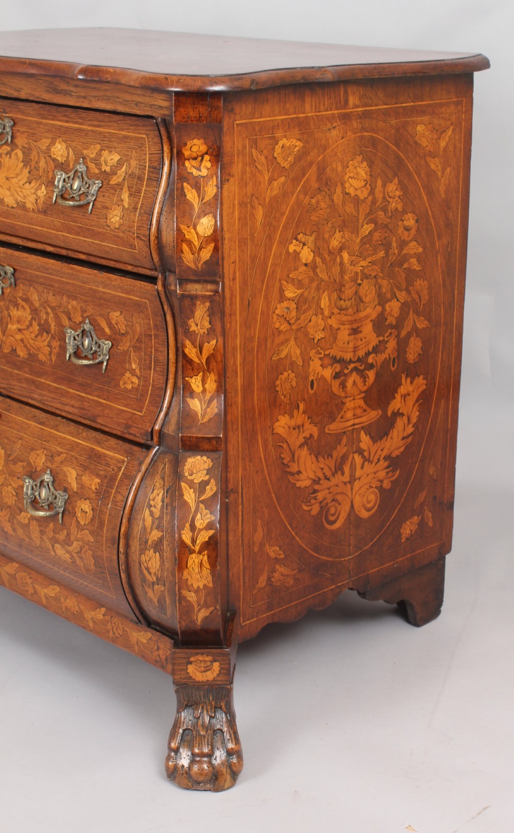Eighteenth century Dutch walnut and marquetry chest-of-drawers of bold bombe form  View V