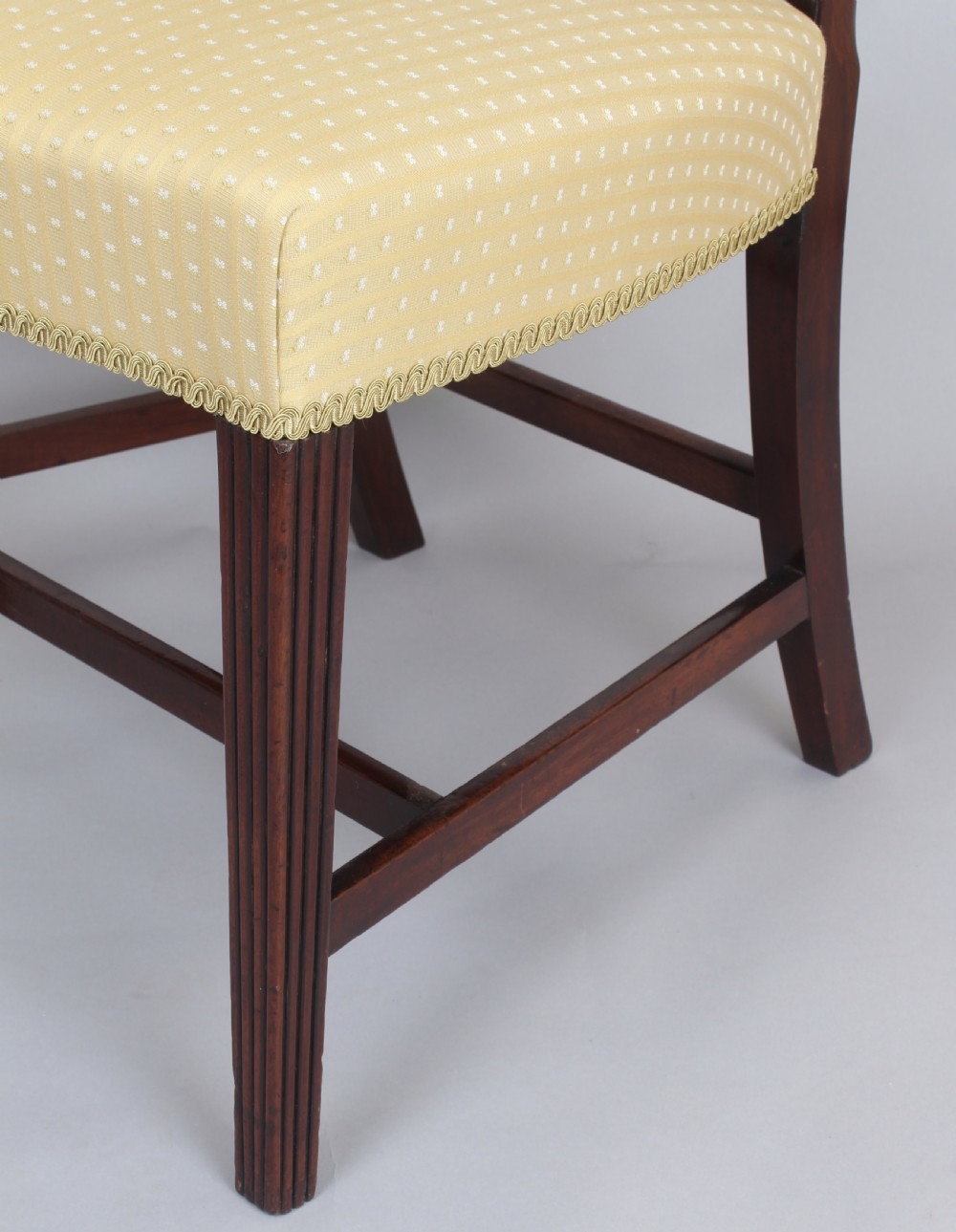 A set of six fine George III period mahogany dining-chairs in the Hepplewhite style View III
