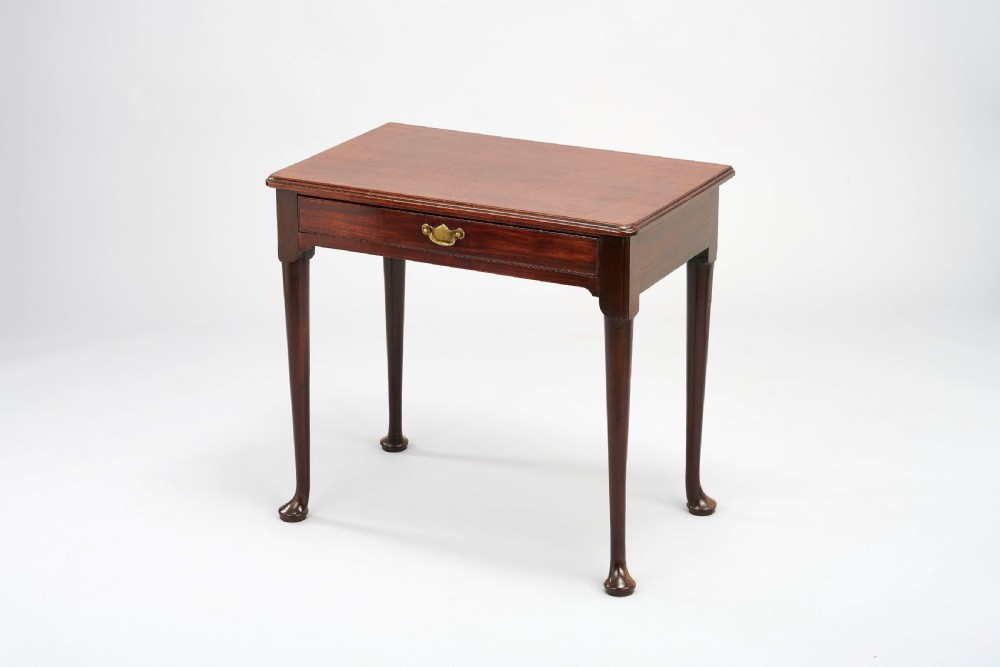 A matched pair of George II period 'red walnut' side-tables View II