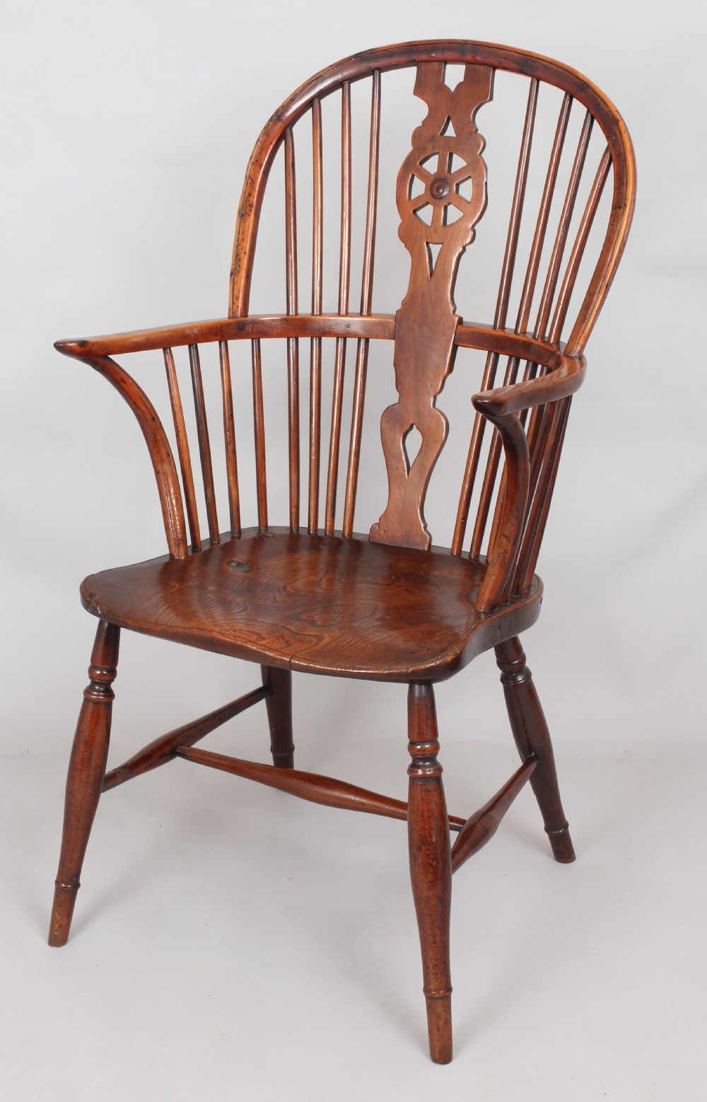 Early nineteenth century yew and elm Windsor arm-chair