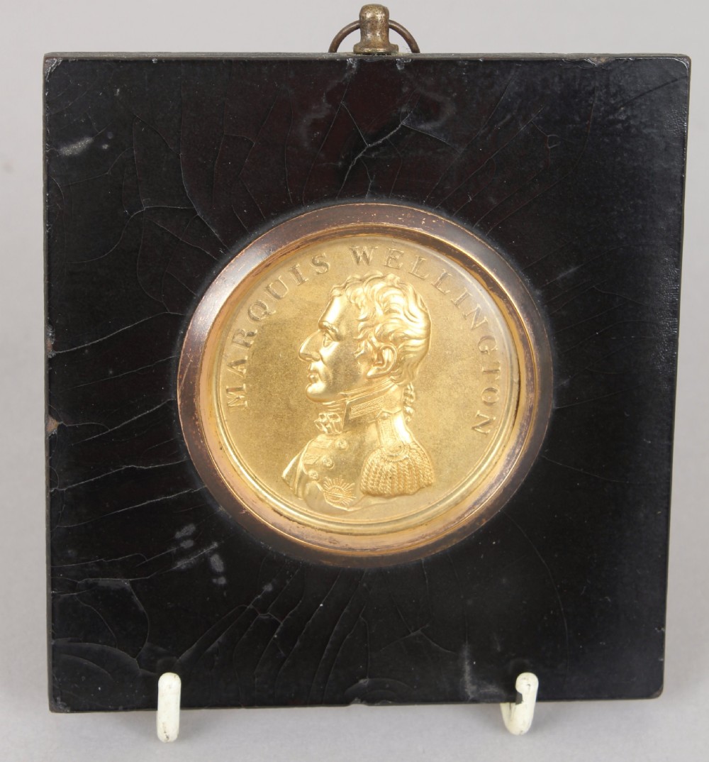 19th century gilt-brass pressed relief plaque of Marquis Wellington 