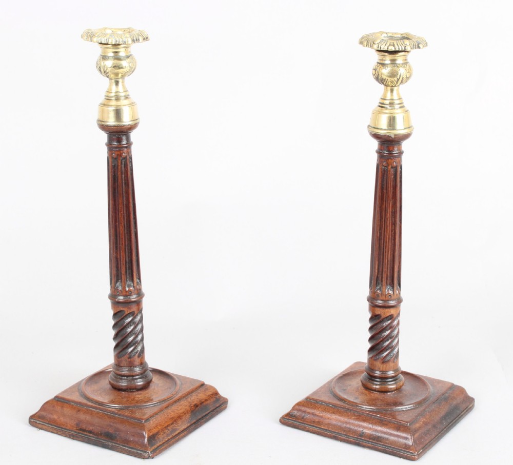 Rare pair of George III mahogany candlesticks