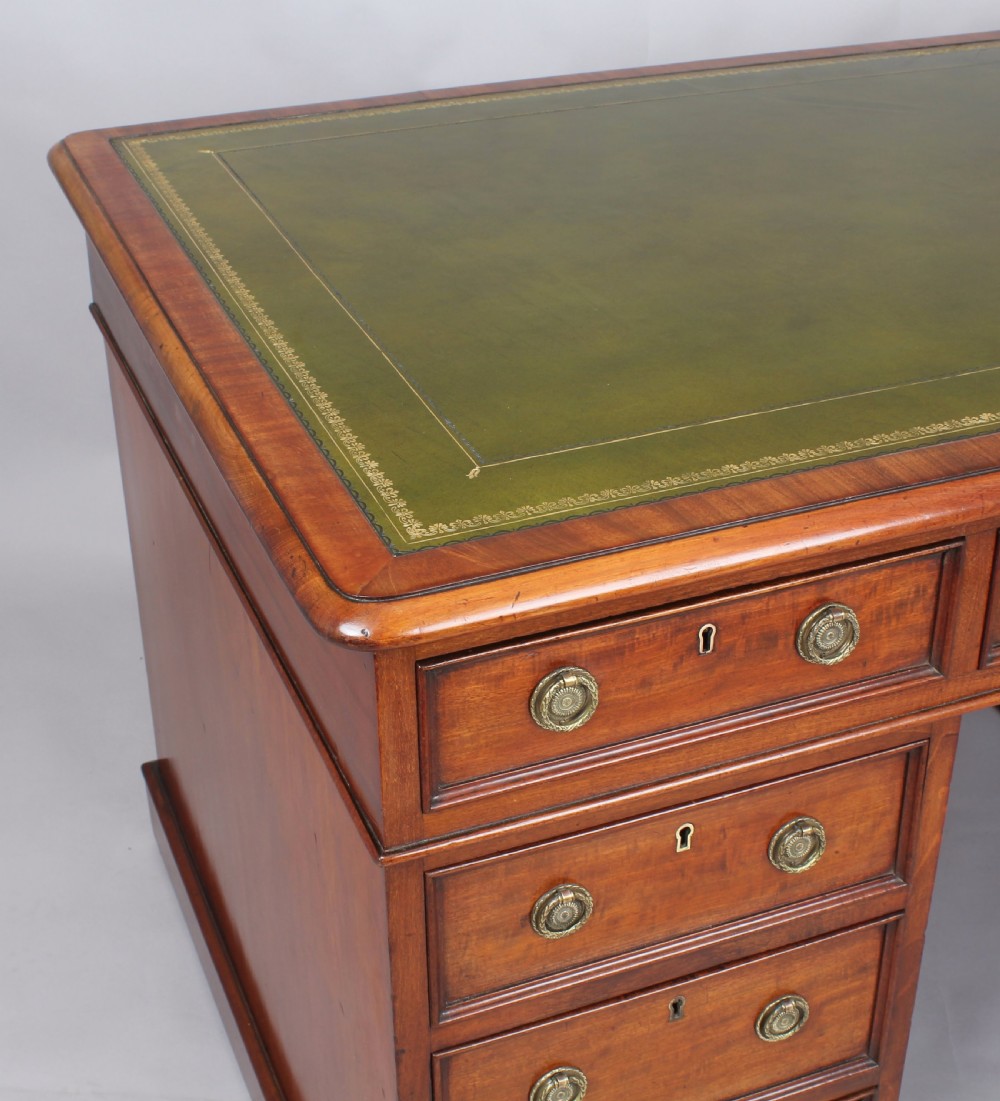 Good quality William IV period mahogany kneehole desk View II