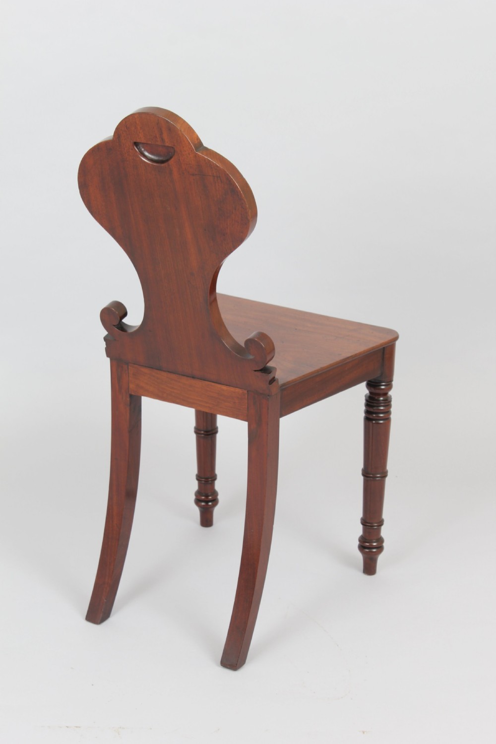 Pair of good quality George IV period mahogany hall-chairs View III