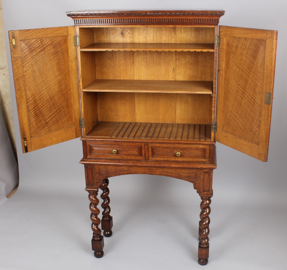 An Edwardian oak stationery cabinet View III