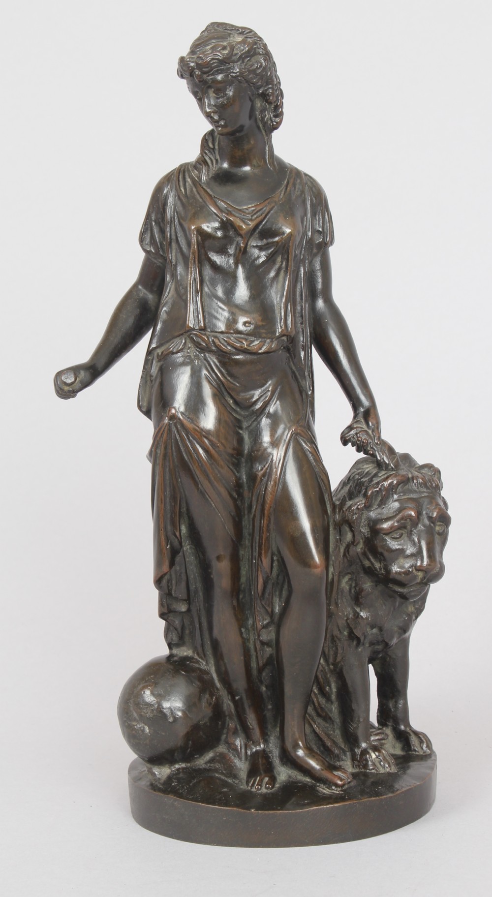 Bronze statuette of a classical woman and lion View II