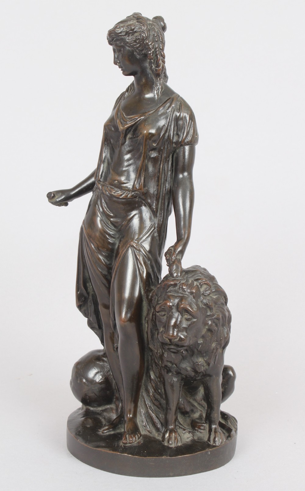 Bronze statuette of a classical woman and lion View VI
