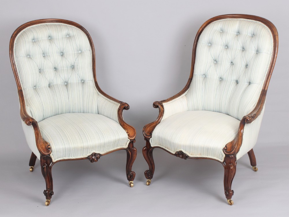 A good pair of early Victorian rosewood arm-chairs