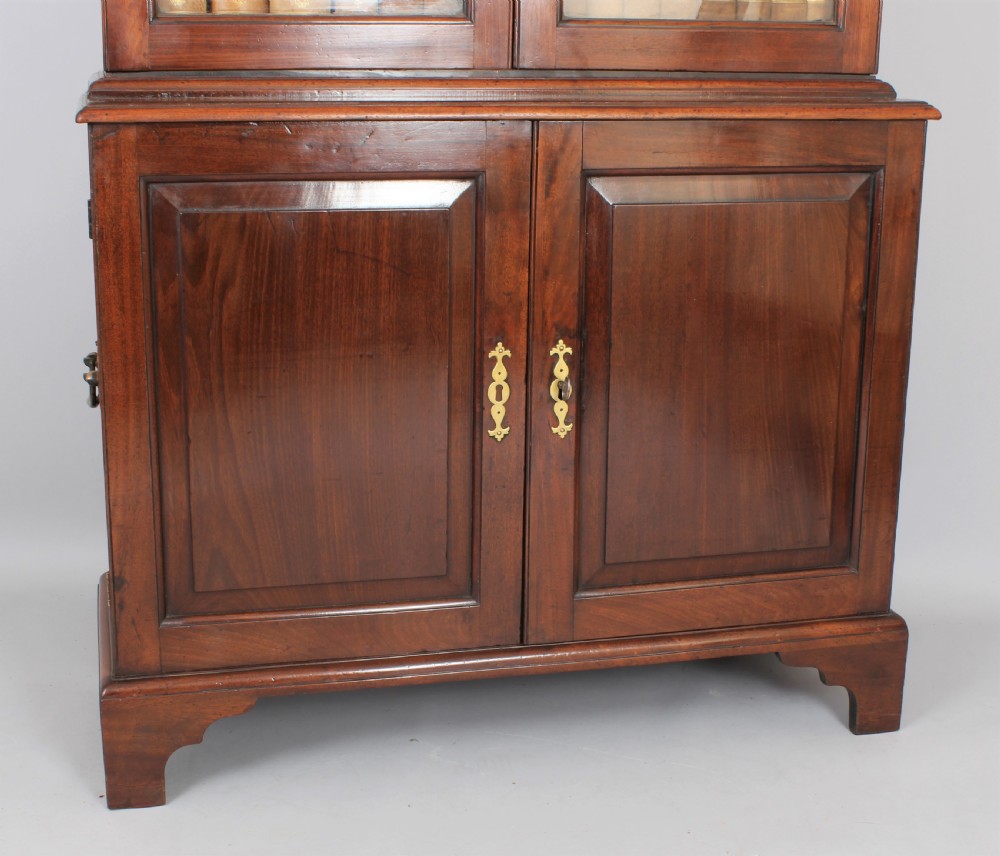 George II 'red walnut' cupboard based bookcase View III