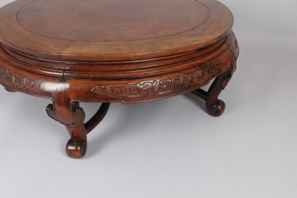 A 19th century Chinese hardwood circular 'Opium' table View V