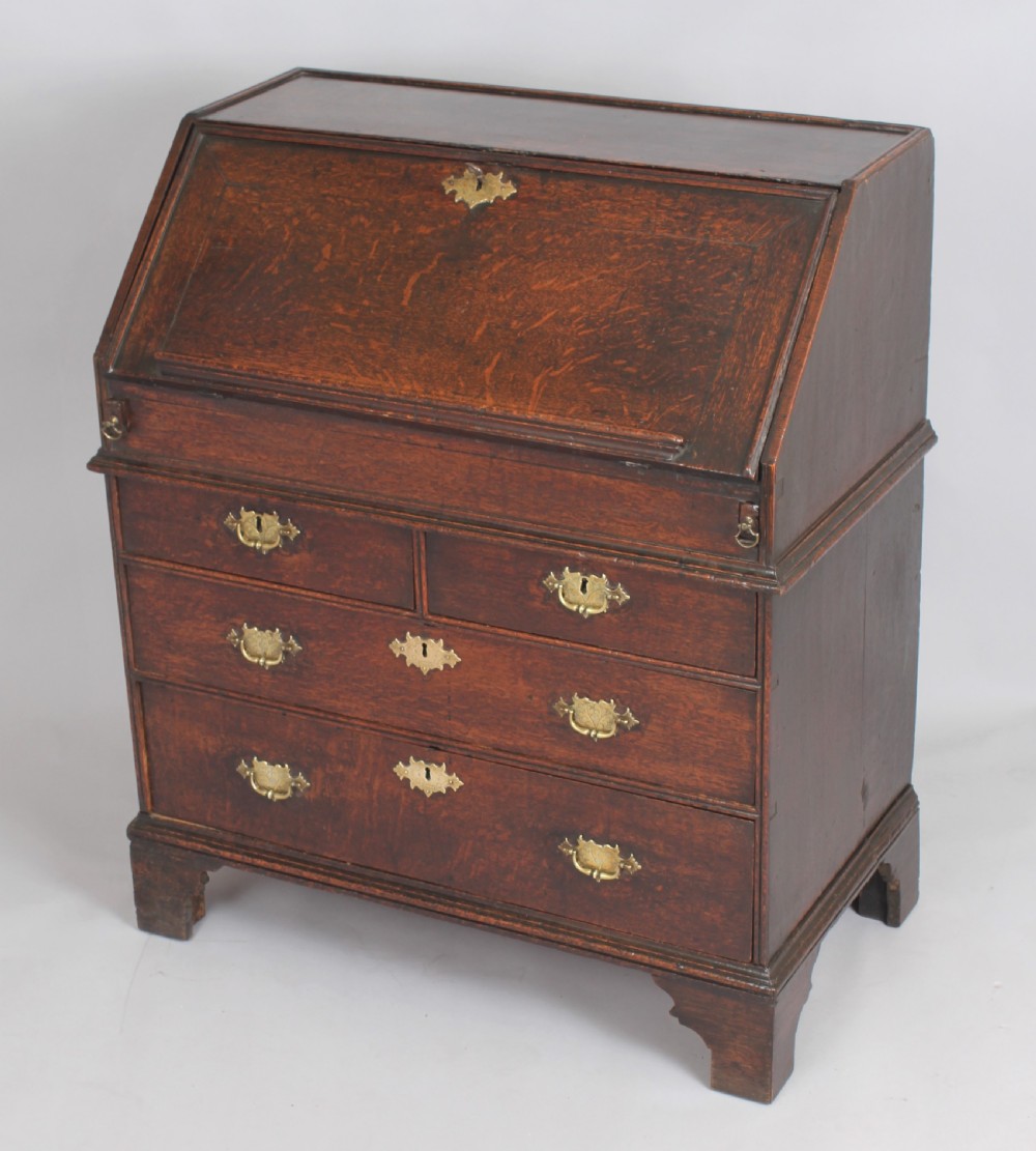 An early 18th century oak bureau View IV