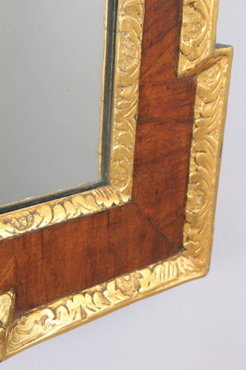 An 18th century walnut and gilt slip rectangular mirror View III
