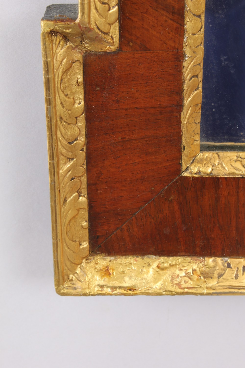 An 18th century walnut and gilt slip rectangular mirror View IV