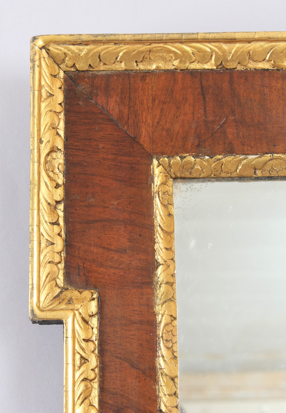 An 18th century walnut and gilt slip rectangular mirror View V