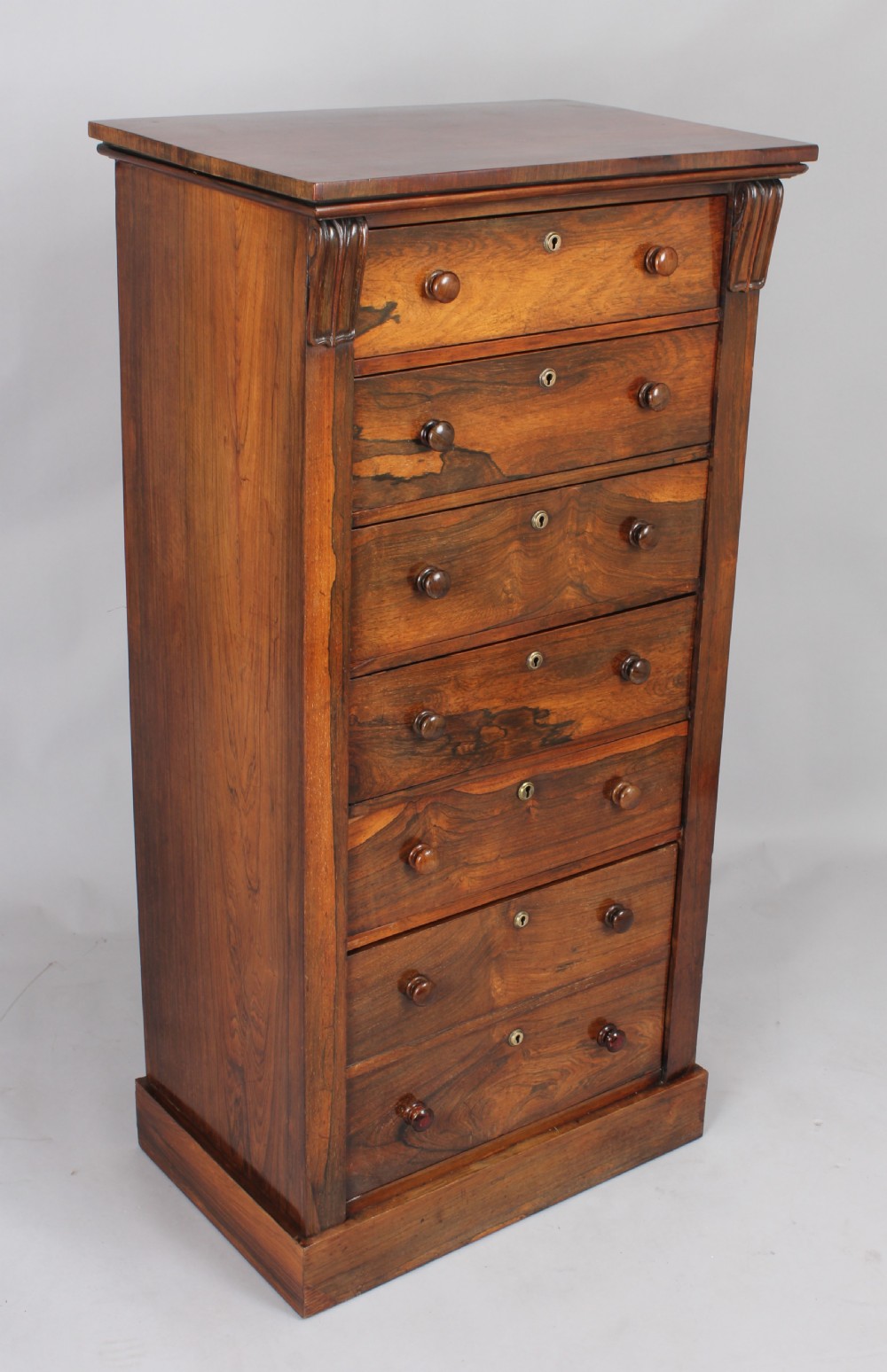 Well-figured and useful rosewood Wellington chest View IV