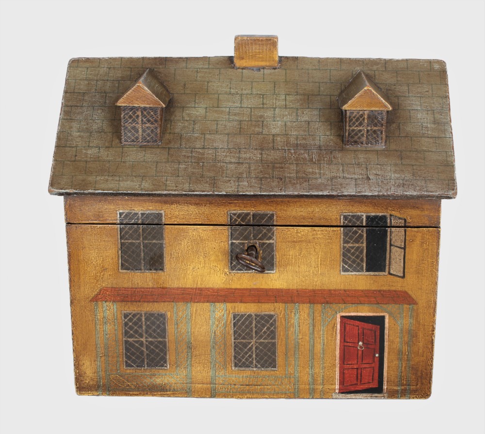 A charming 19th century 'house' tea caddy View II