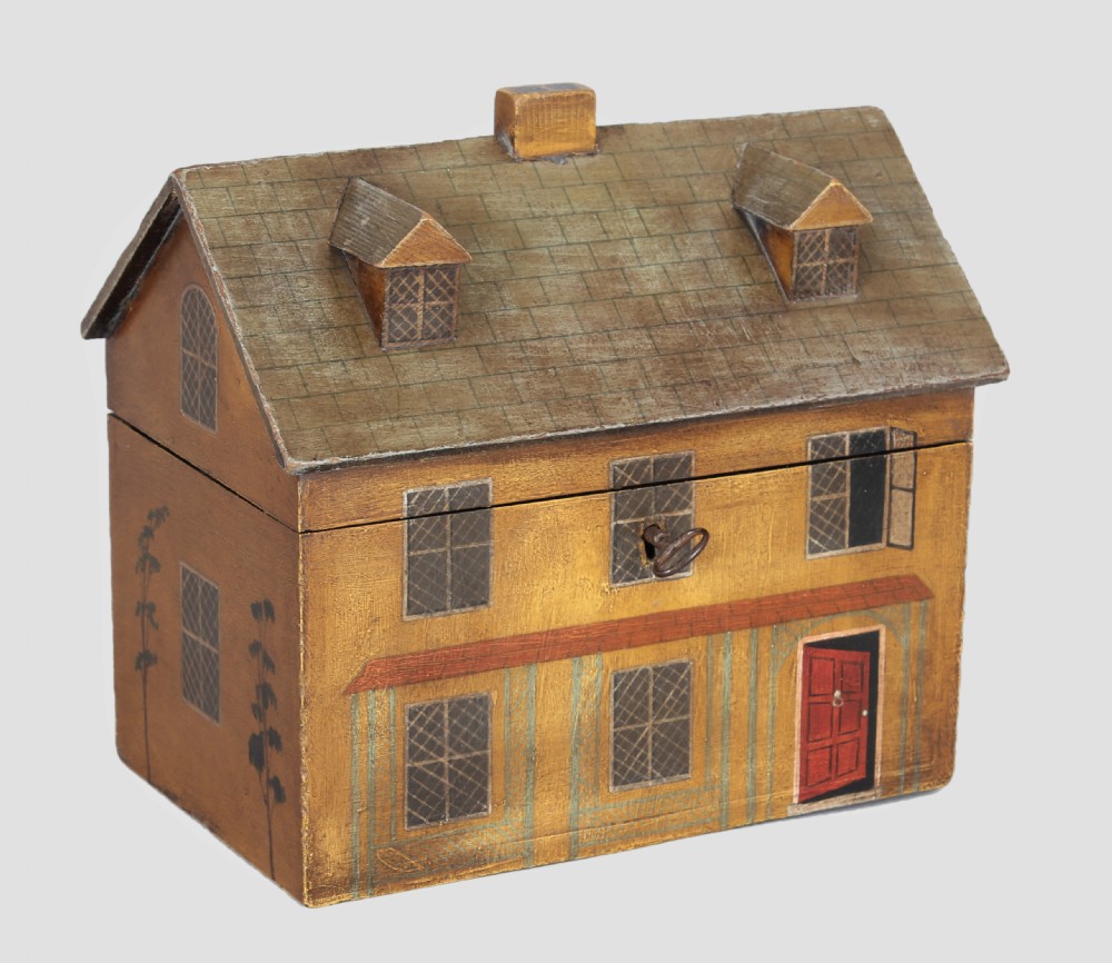A charming 19th century 'house' tea caddy View III