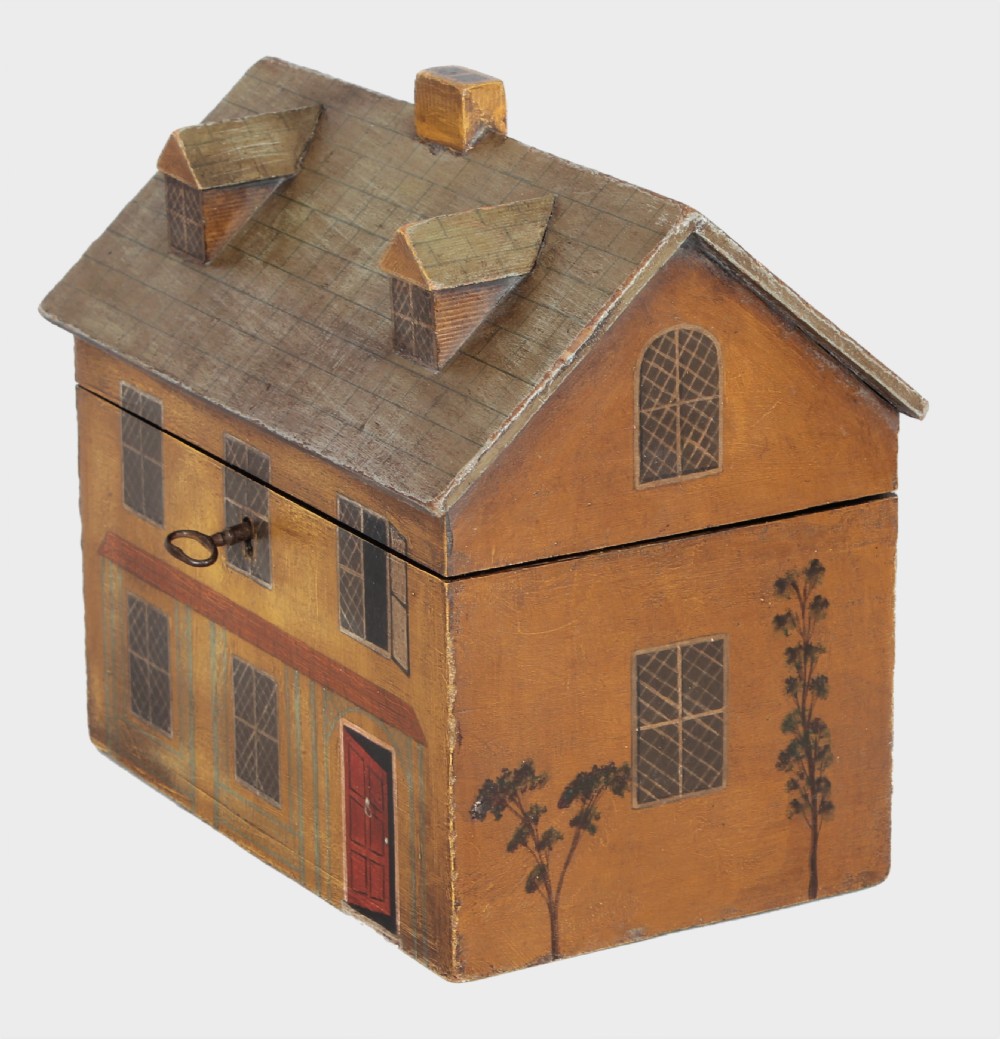 A charming 19th century 'house' tea caddy View IV