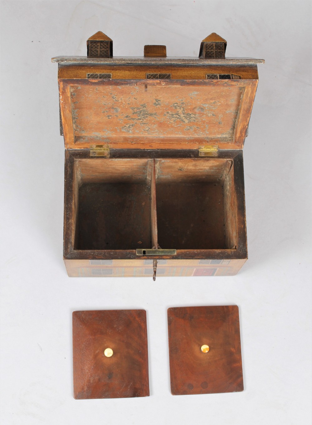 A charming 19th century 'house' tea caddy View VI