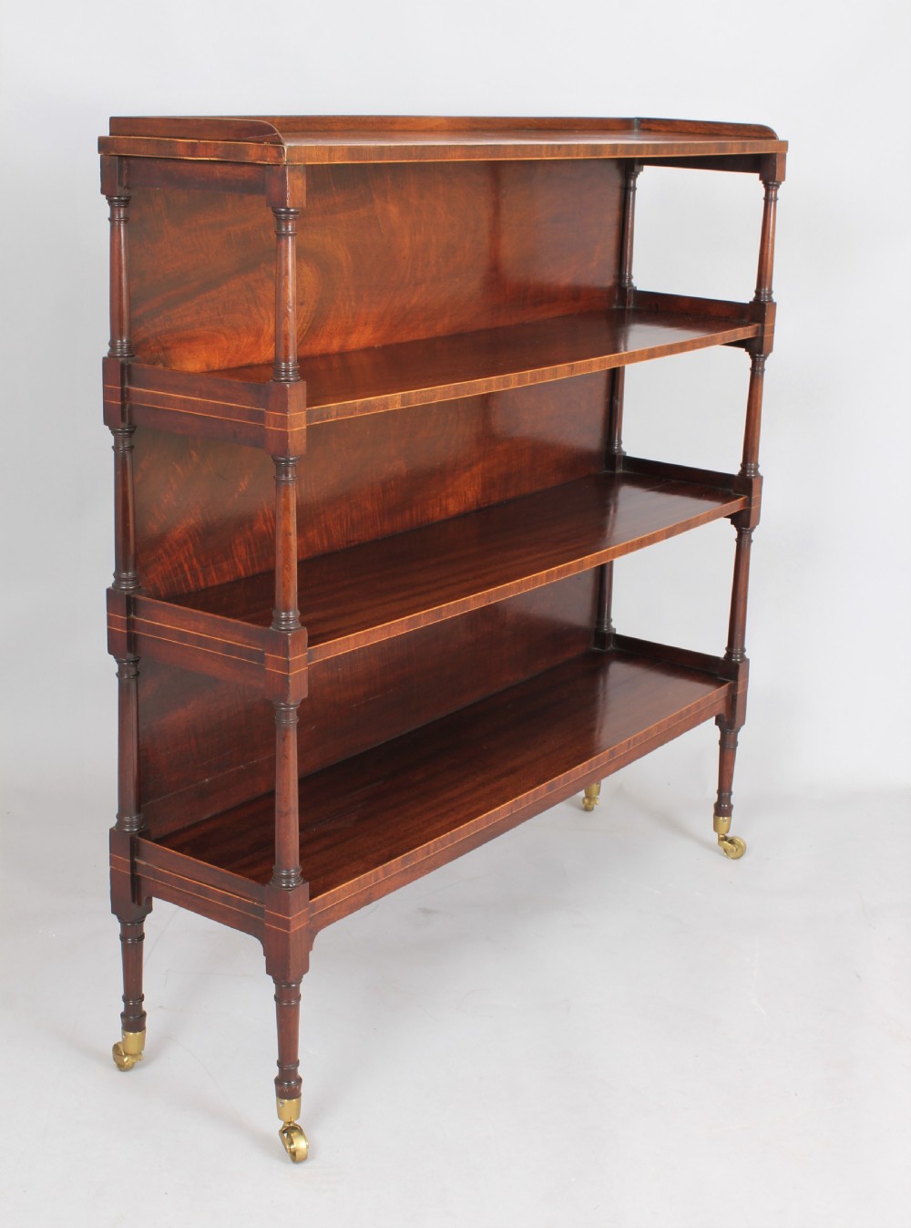 Fine George III mahogany and boxwood strung four tier open shelves View III