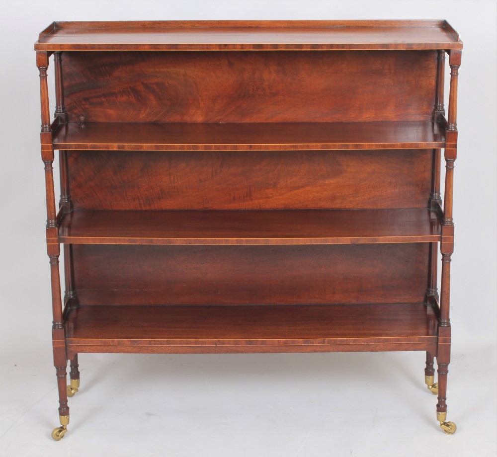Fine George III mahogany and boxwood strung four tier open shelves View V