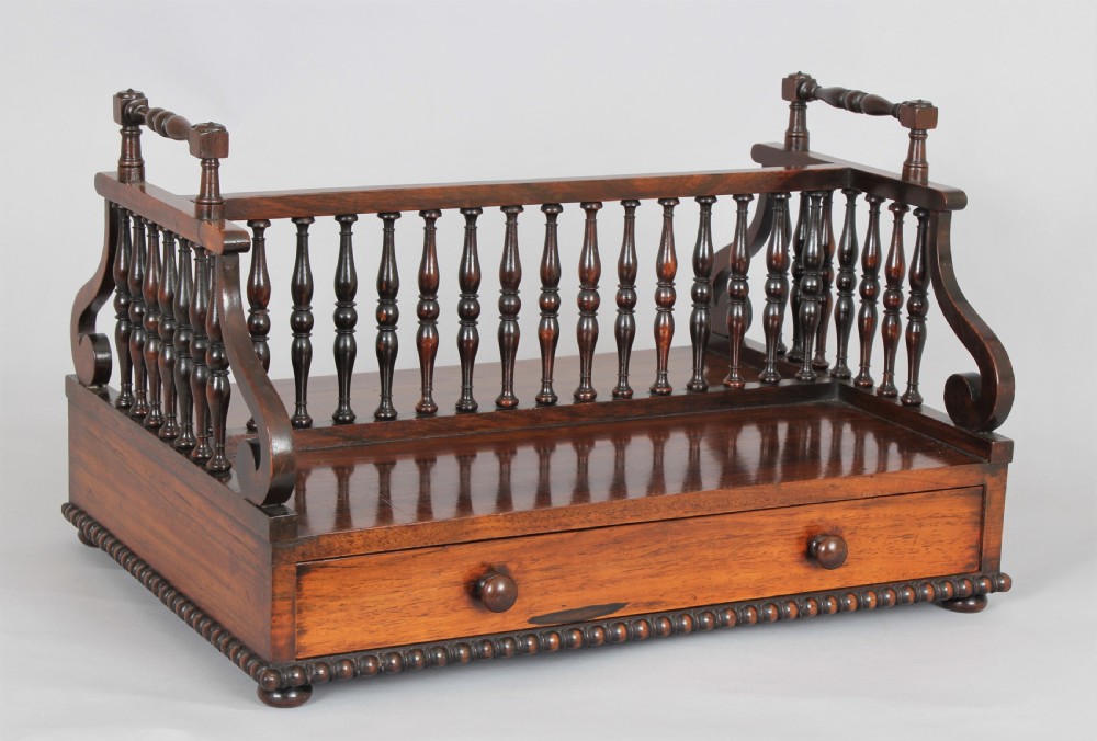 A fine Regency period rosewood book carrier in the manner of Gillows of Lancaster