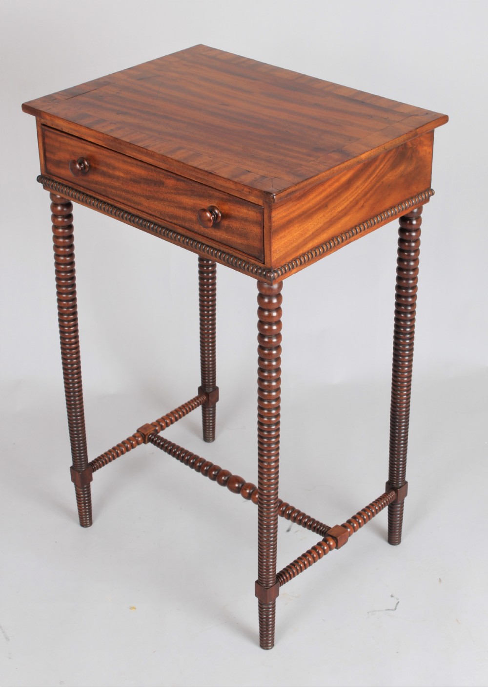 Mahogany end table with a figured and cross-banded top View V