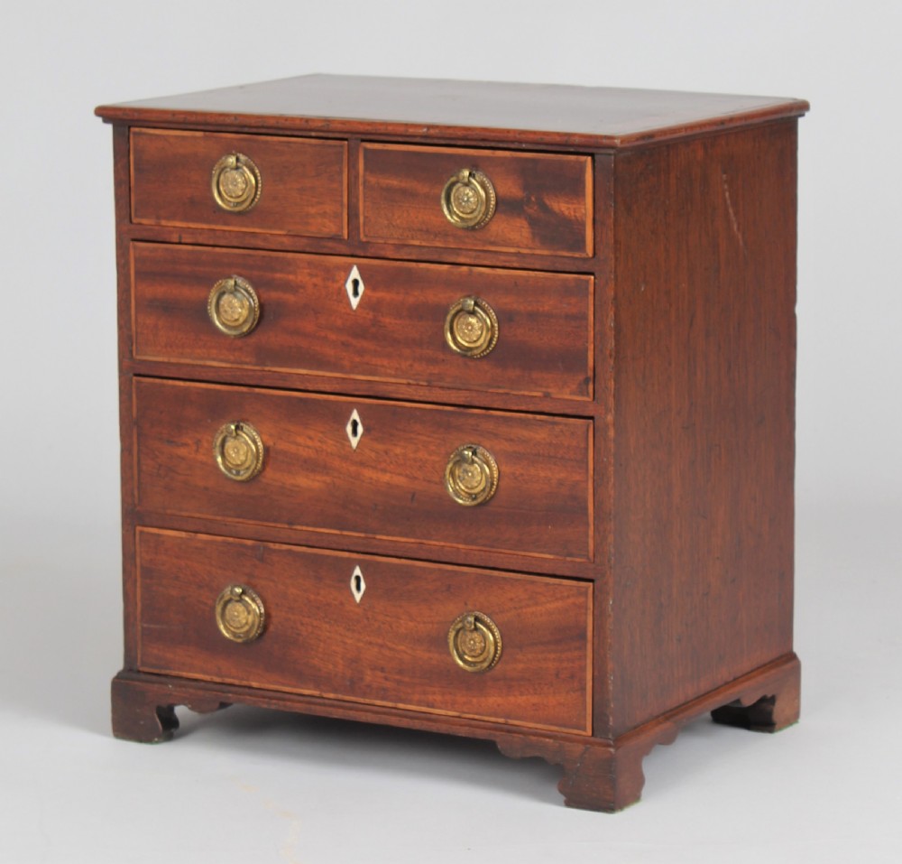 Delightful late 18th century miniature chest of drawers