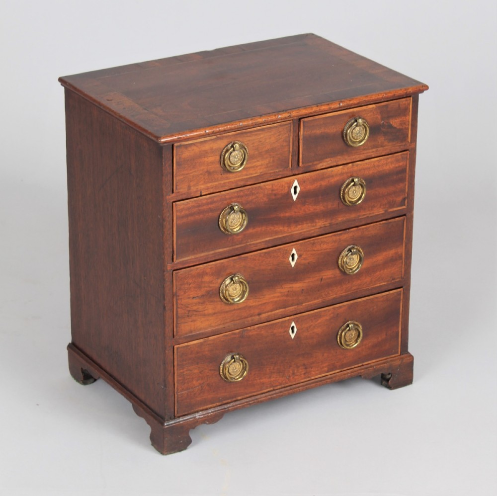 Delightful late 18th century miniature chest of drawers View IV