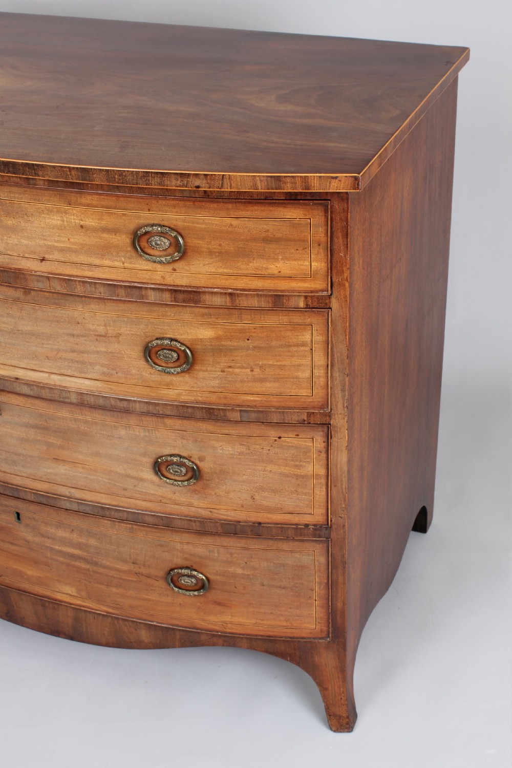George III period mahogany bow fronted chest of drawers in the manner of Gillows of Lancaster View II