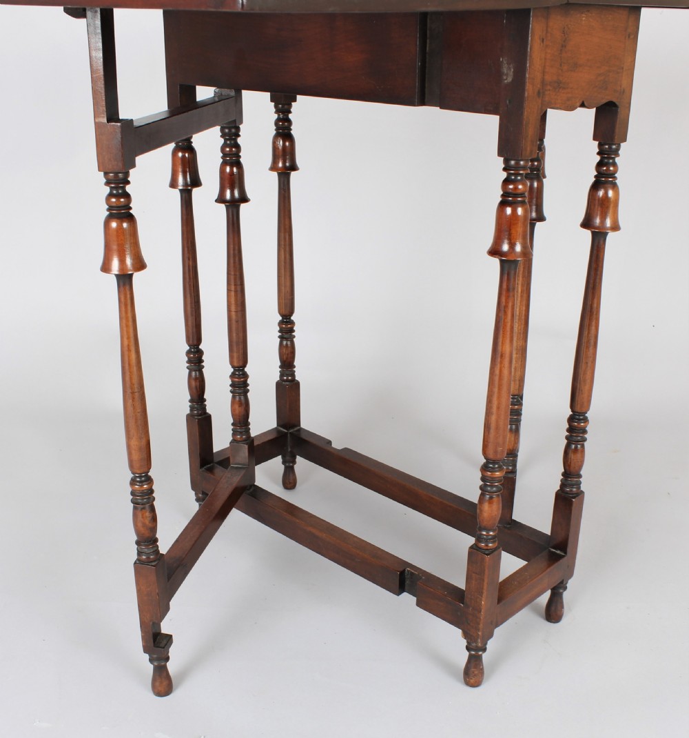 Edwardian burr walnut and parquetry Sutherland table of rare form View III