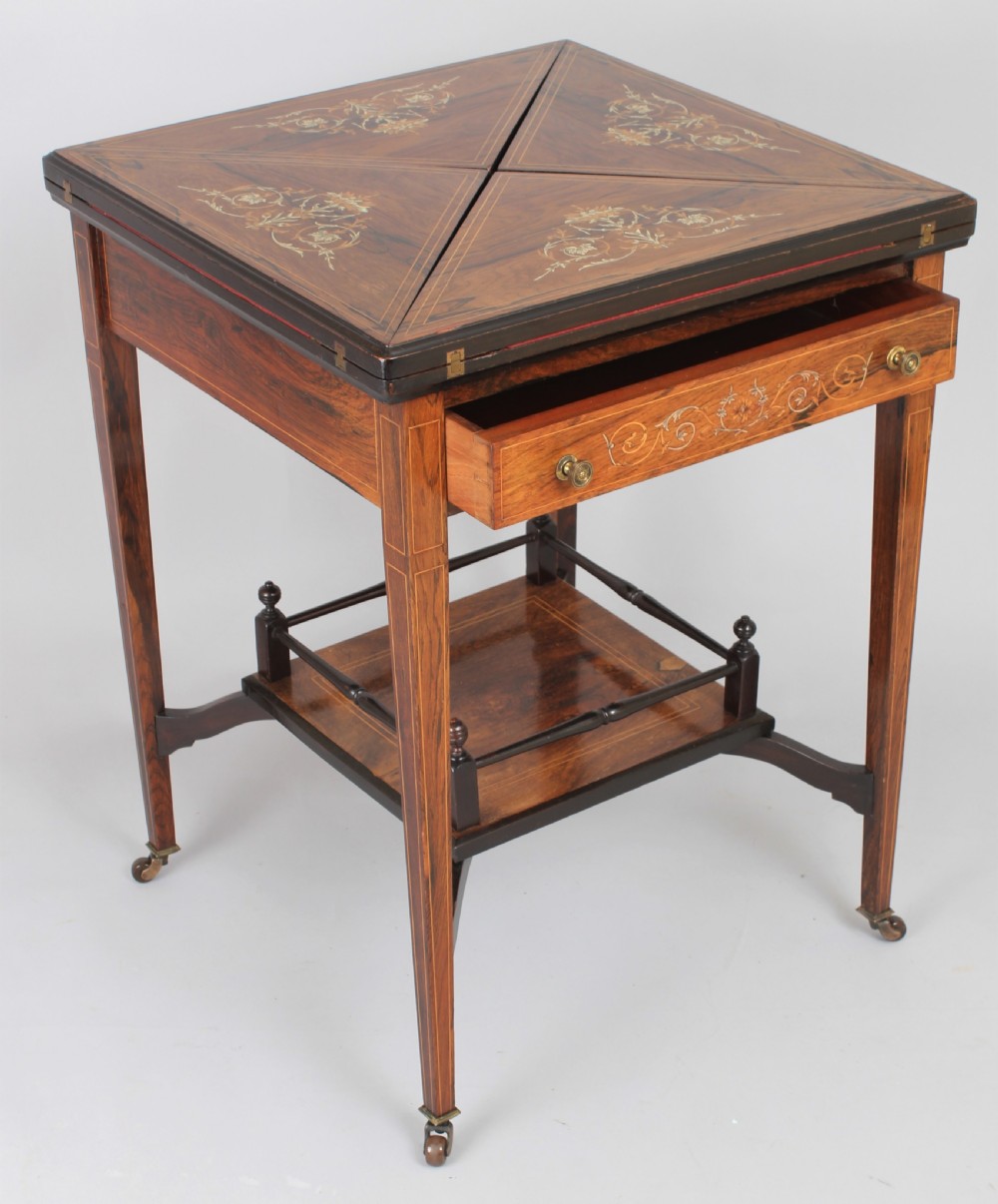 Edwardian rosewood envelope games table