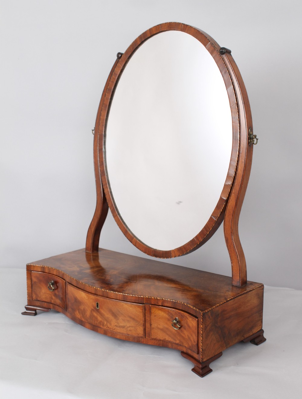 George III period mahogany toilet mirror of good figure and colour View III