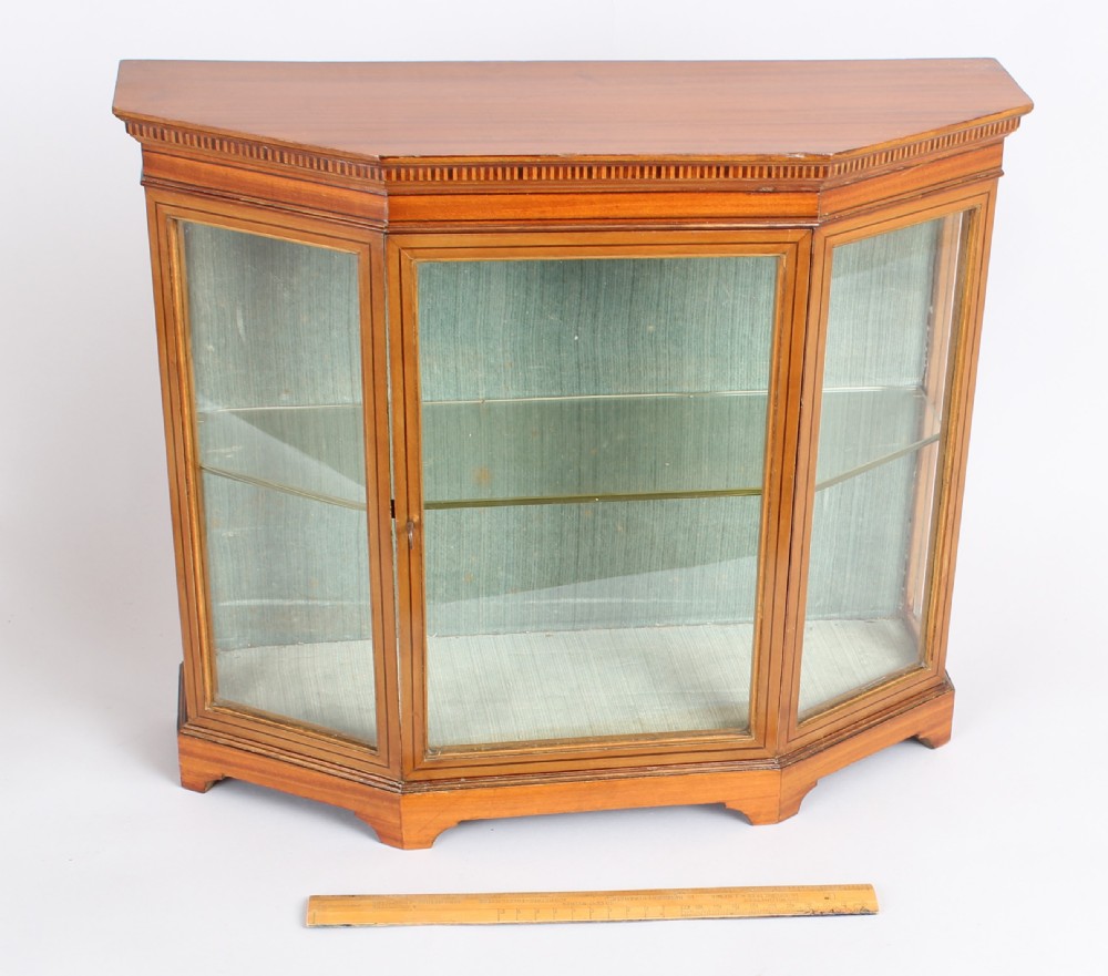 An Edwardian satinwood miniature glazed display cabinet