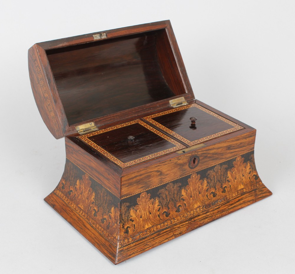 A nineteenth-century domed rosewood tea caddy with elaborate geometric inlaid borders and a central landscape transfer image on the lid. View IV